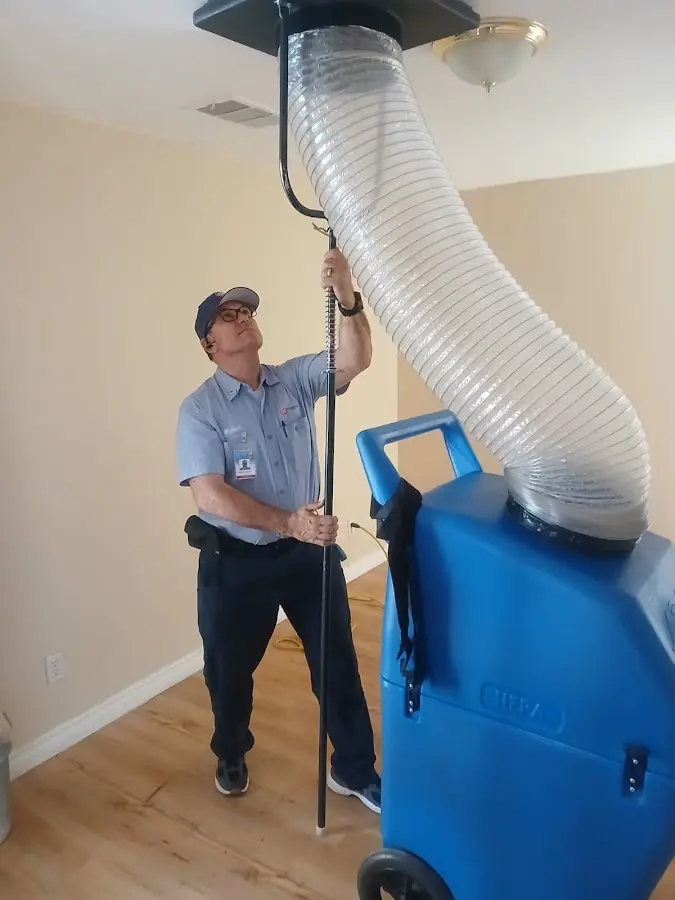 Mini Split Installation technician using HEPA equipment in Jupiter